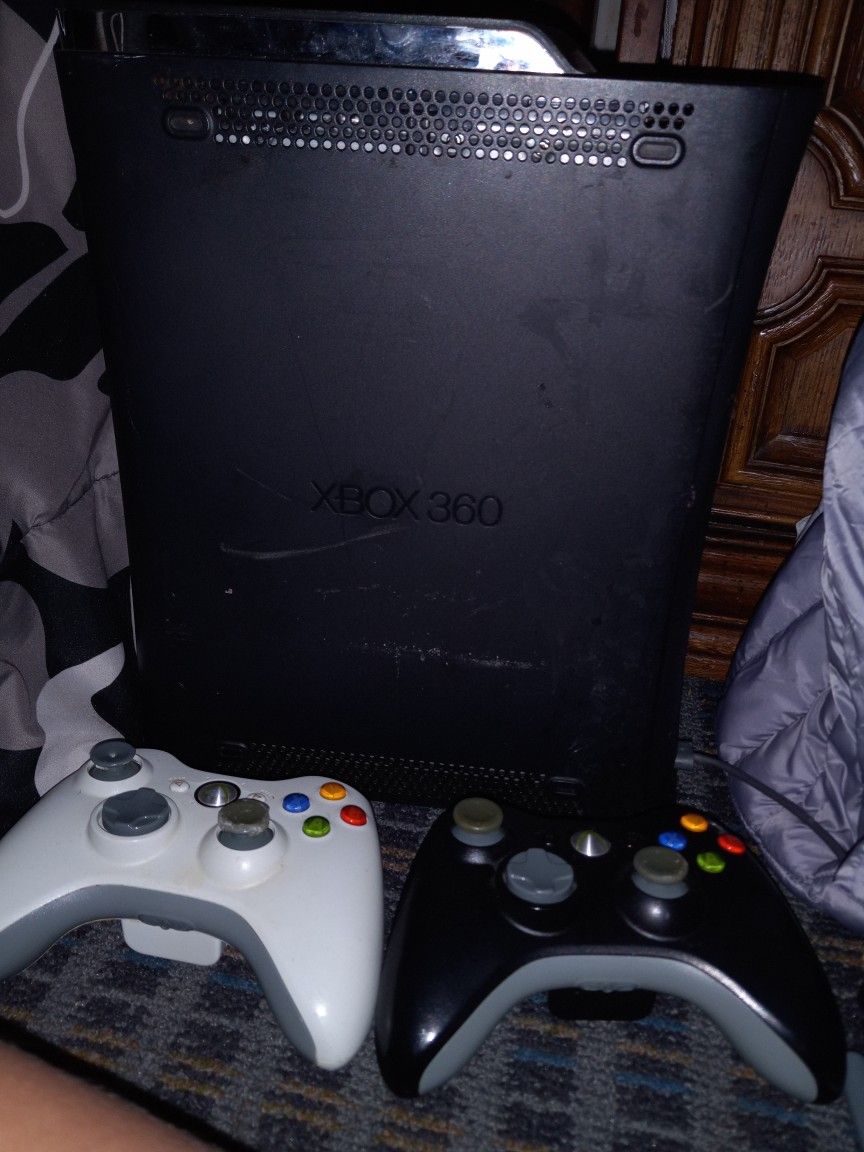 Xbox360 With 2 Controls And Power Cord Works Well