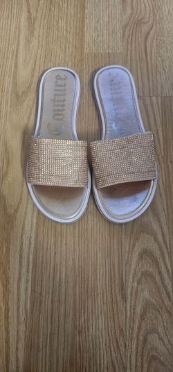 Juicy Couture "Yummy" slide sandals feature rose gold rhinestone