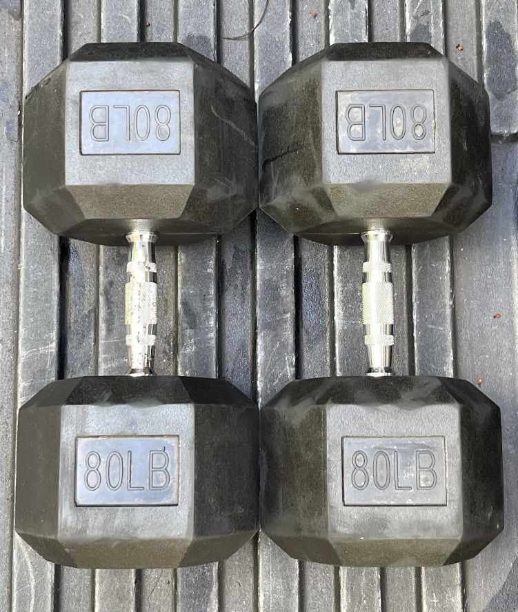 USED 80 LB. RUBBER DUMBBELLS