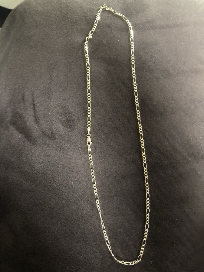 Real Silver chain color gold.