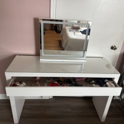 Nice table and makeup mirror with built-in light.