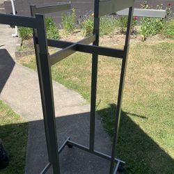 4-way commercial metal clothing rack.
