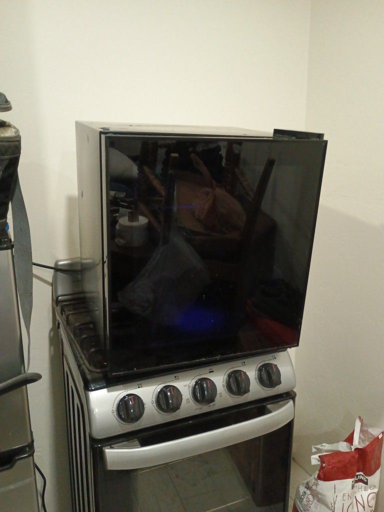 Black Mini Fridge. Like New 130.obo