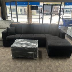 New Black Sectional And Ottoman 