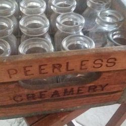 Vintage crate and cream bottles PEERLESS CREAMERY