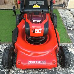 CRAFTSMAN 60 VOLT LAWN MOWER AND 20 VOLT WEED EATER