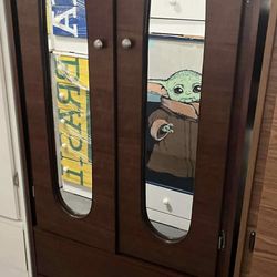 Tall closet with mirrors