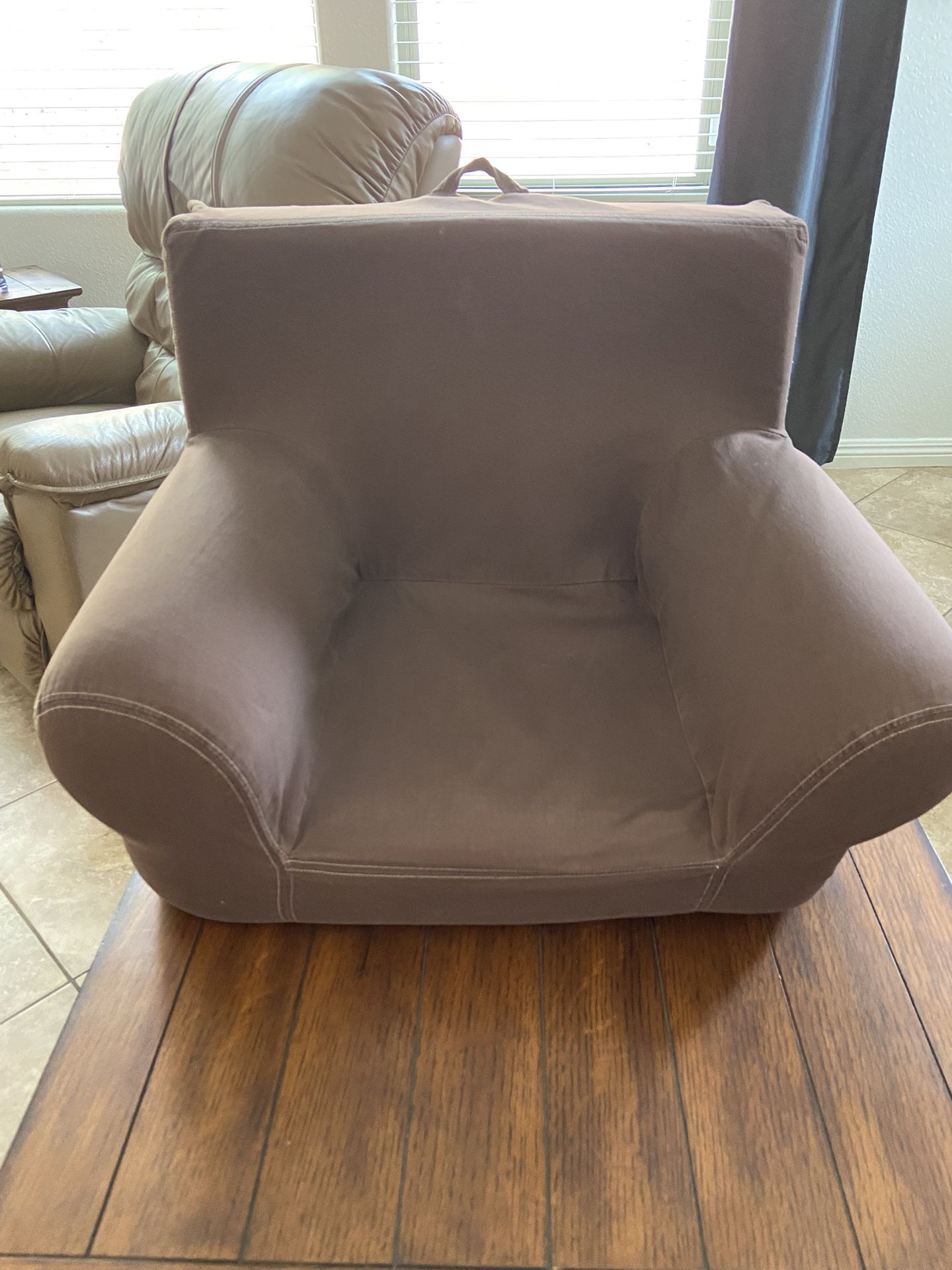 Brown Pottery Barn anywhere kid chair Tropicana town center area $30 My First Overall: 20.5" wide x 16.5" deep x 17.75" high Seat: 10" wide x 10.5" de