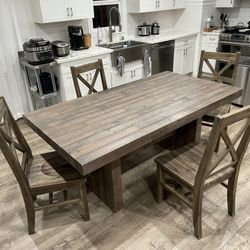 Reclaimed wood dining table with matching 4 chairs (72” x 39” x 31”). In Excellent Condition.  Cash Price is Firm.