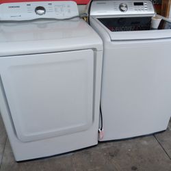 Washer And Dryer And Dryer Like New With Warrantty