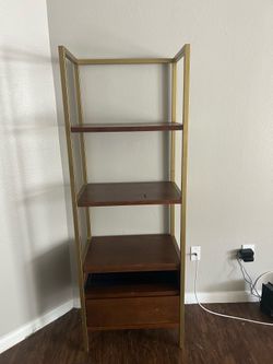 Wooden shelf with gold frame