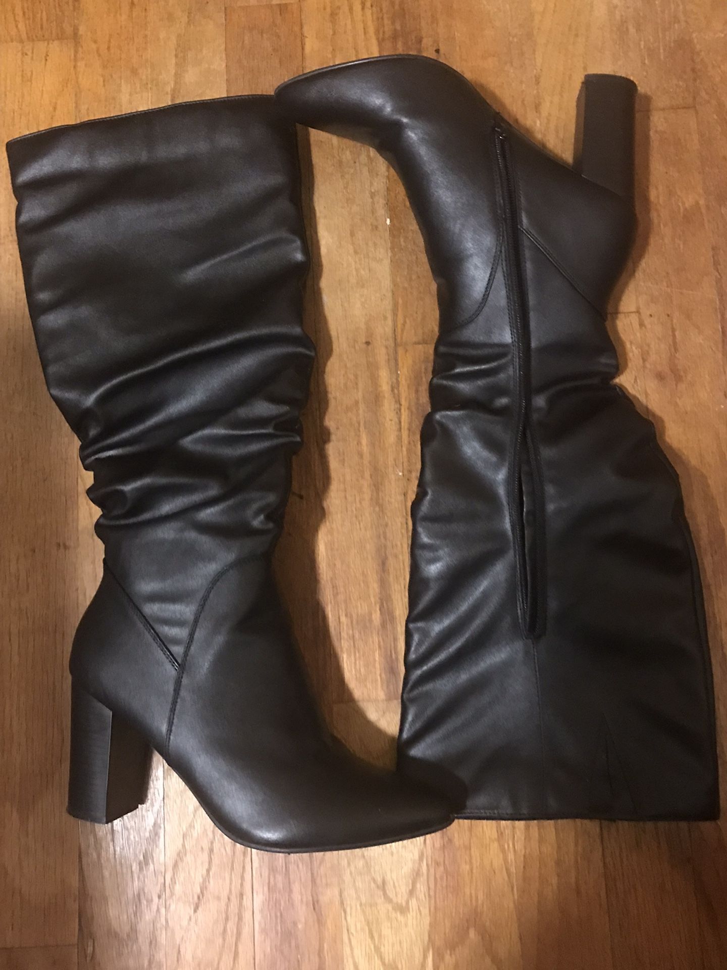 womens tall black boots 8.5, zips up, gently used, great condition