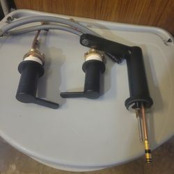 Signature Hardware Berwyn Widespread Bathroom Faucet in a matte black finish. 