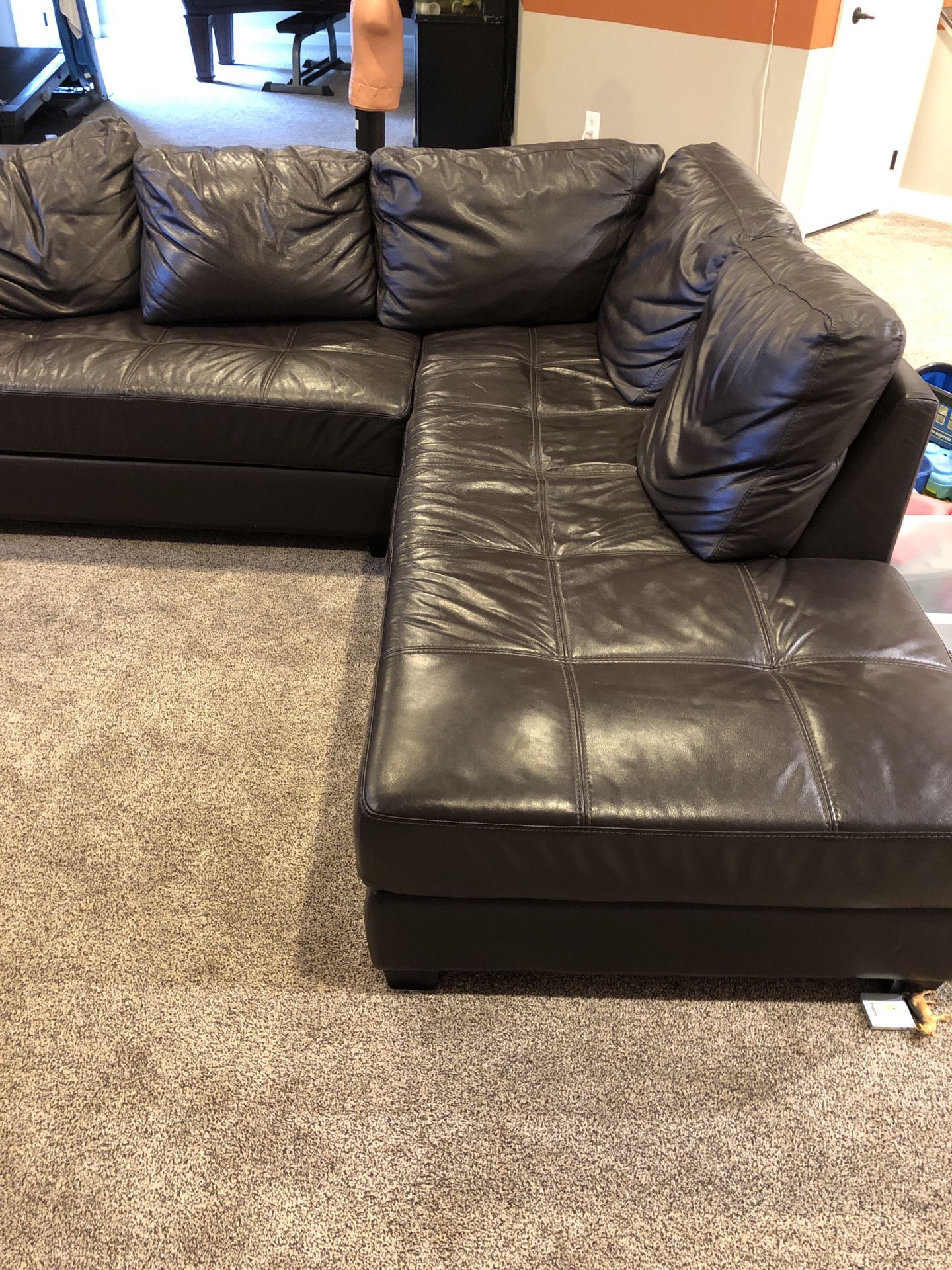 Brown leather sectional sofa