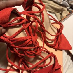 Red strap heels