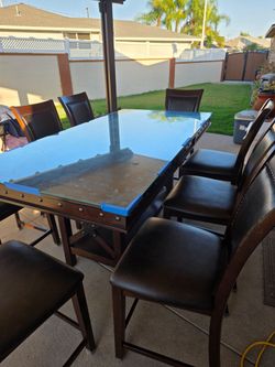 Dinning Table with protective glass - $700 obo
