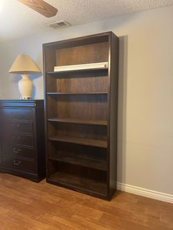 Tall cabinet library books