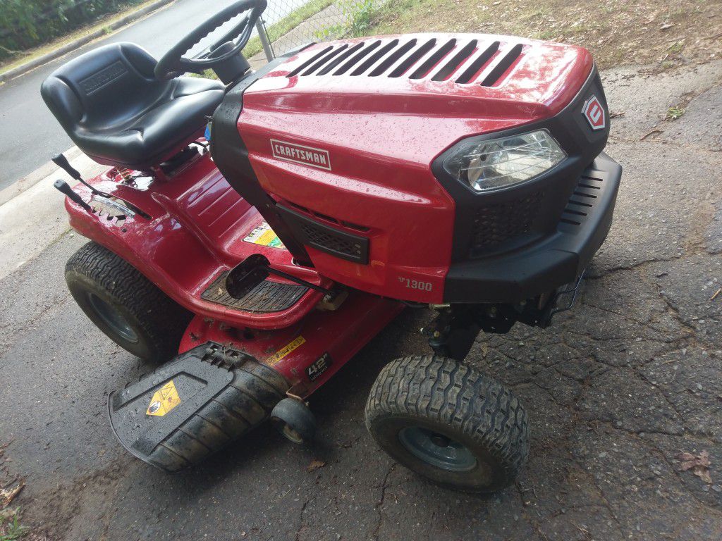 Craftsman T1300 riding Mower. New almost.
