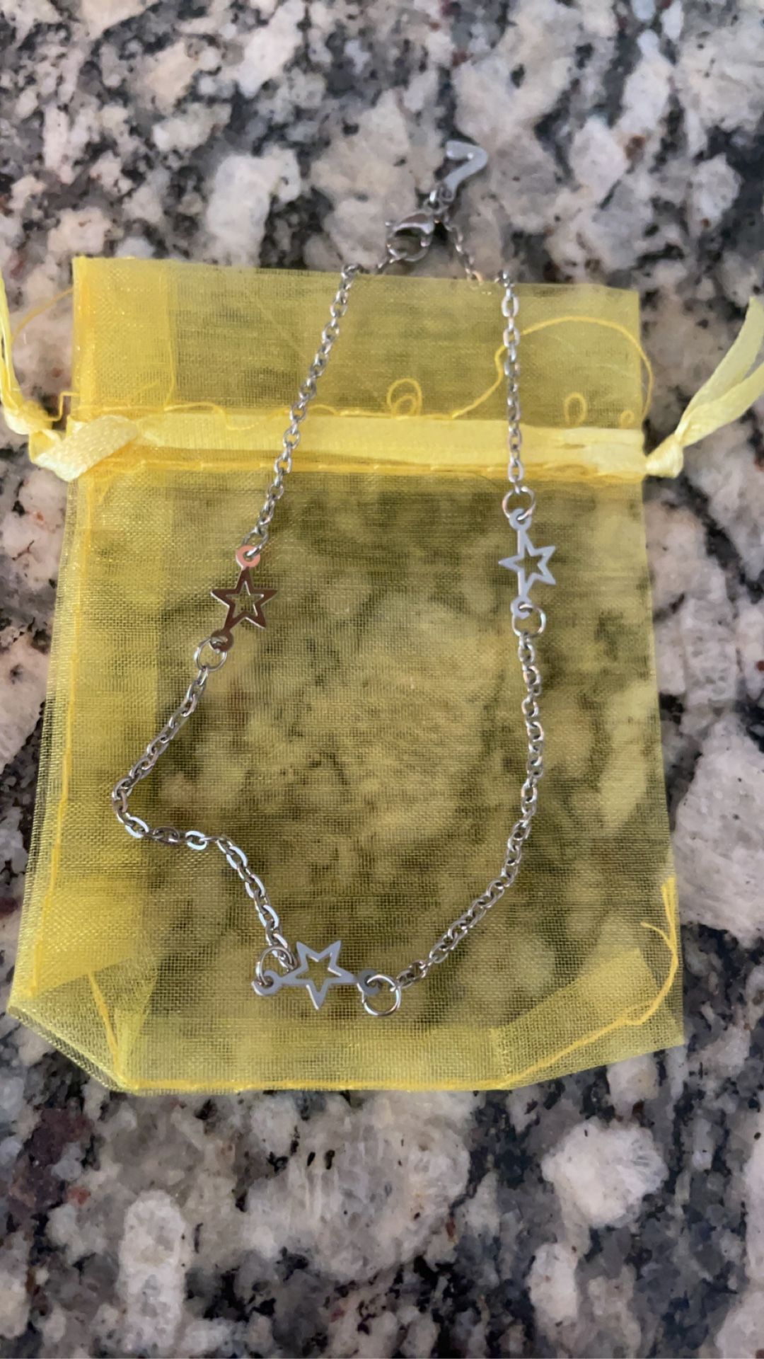 NWOT silver star anklet/bracelet