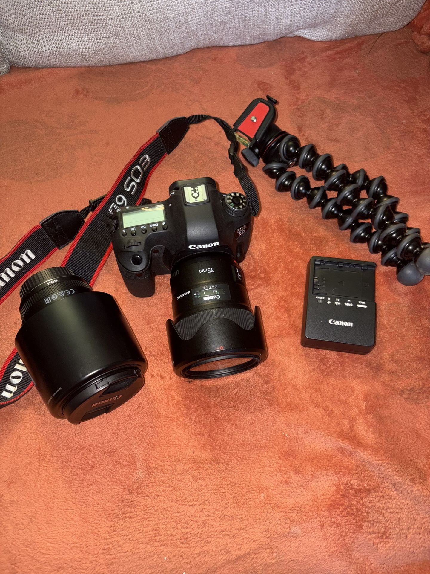 Canon EOS 6D camera, used only 3 times, practically new and in perfect working order with all accessories. The 35mm f/1.4L II USM lens is priced at ap