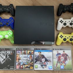 PS3 with 4 games & 6 controllers