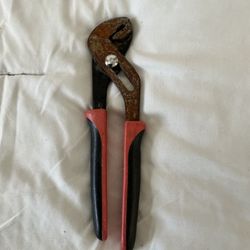 a pair of tongue-and-groove pliers or Lock pliers (or adjustable water-pump pliers).