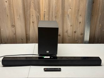 Soundbar with wireless subwoofer and remote