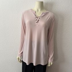 Simply styled light pink long-sleeve top with a lace-up V-neck design Size M