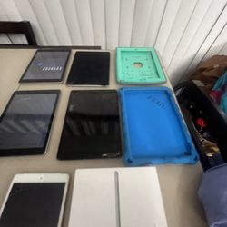 Lot of 5 ipads as is only know the password to one ipad but that also had iCloud see all pics. 2 cases and one box   Apple iPad Air 2 16GB Wi-Fi A1566