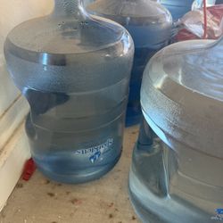 8- 5 Gallon Water Jugs 