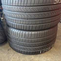 21” tires semi new pirelli 315/30/21 with free installation $250 both