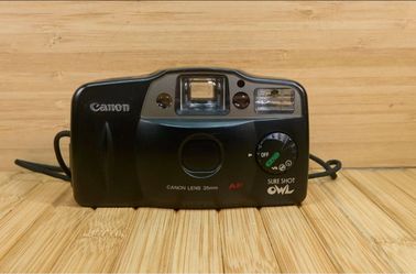 Canon Sure Shot Owl is a 35mm point-and-shoot film camera