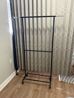 Clothes hanger on wheels