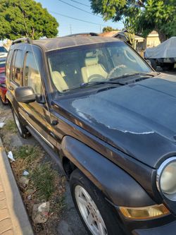 Two thousand and five jeep liberty let's bite the whole car for parts.Engine starts does not right well