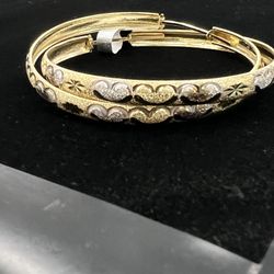 $875 Two Tone Gold Heart Hoop Earrings