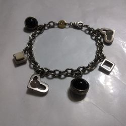 Movado Sterling Silver And 18 Karat Gold Charm Bracelet Lent 7 1/2  Use