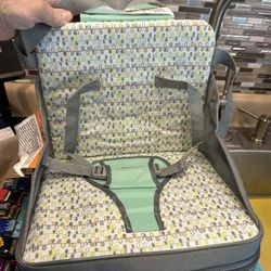 The First Years On-The-Go Booster Seat.  It is a self-inflating, portable full-size booster seat. 