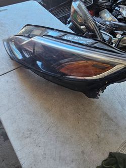 Chevy Malibu left Headlight oem