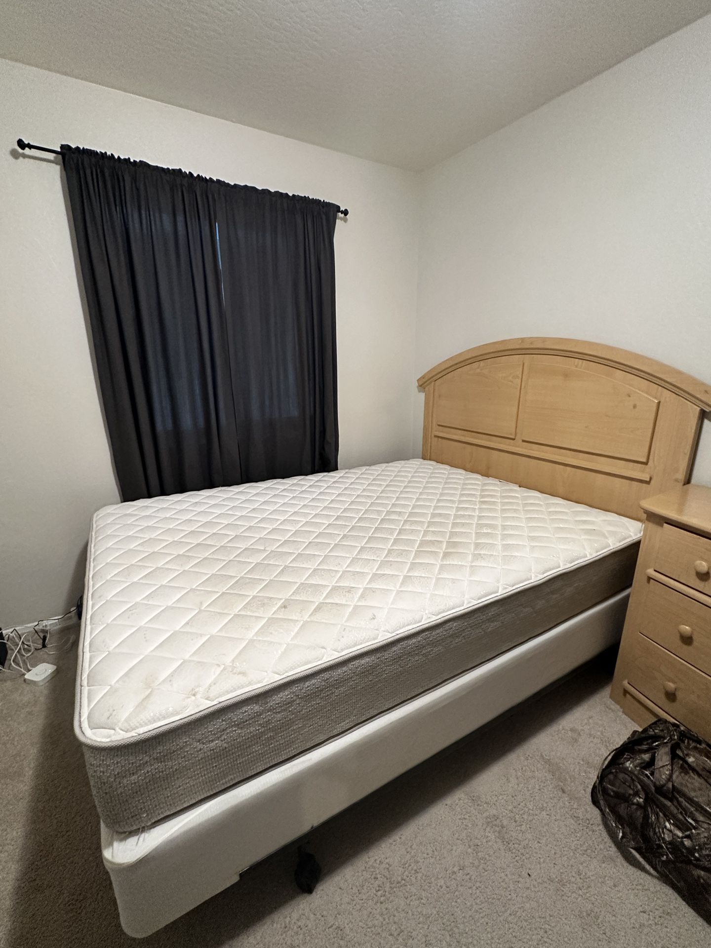 Wooden headboard, mattress, frame, dresser and mirror, and side table
