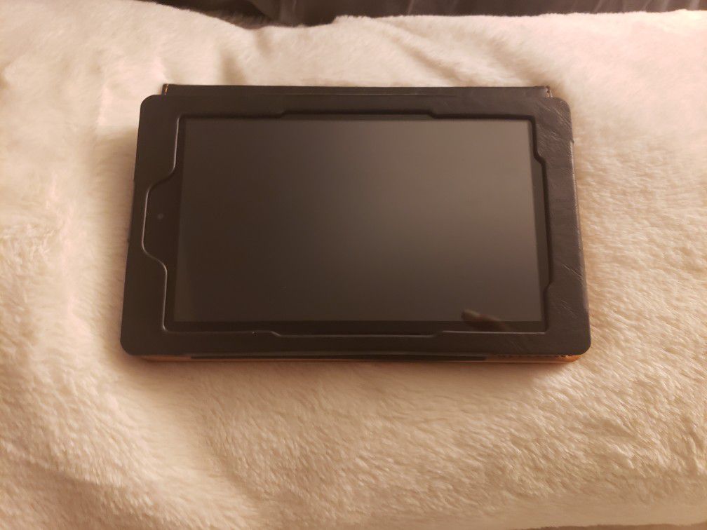 Brand new Kindle Fire 7 with a case
