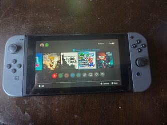 Nintendo switch v2 128gb games $300