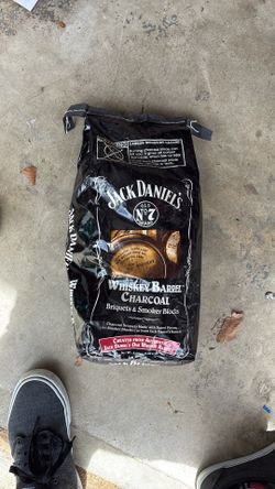 Jack Daniels, whiskey barrel, charcoal, briquettes, and smoker blocks for outdoor grilling only. 6.8 pounds charcoal briquettes made with barrel piece