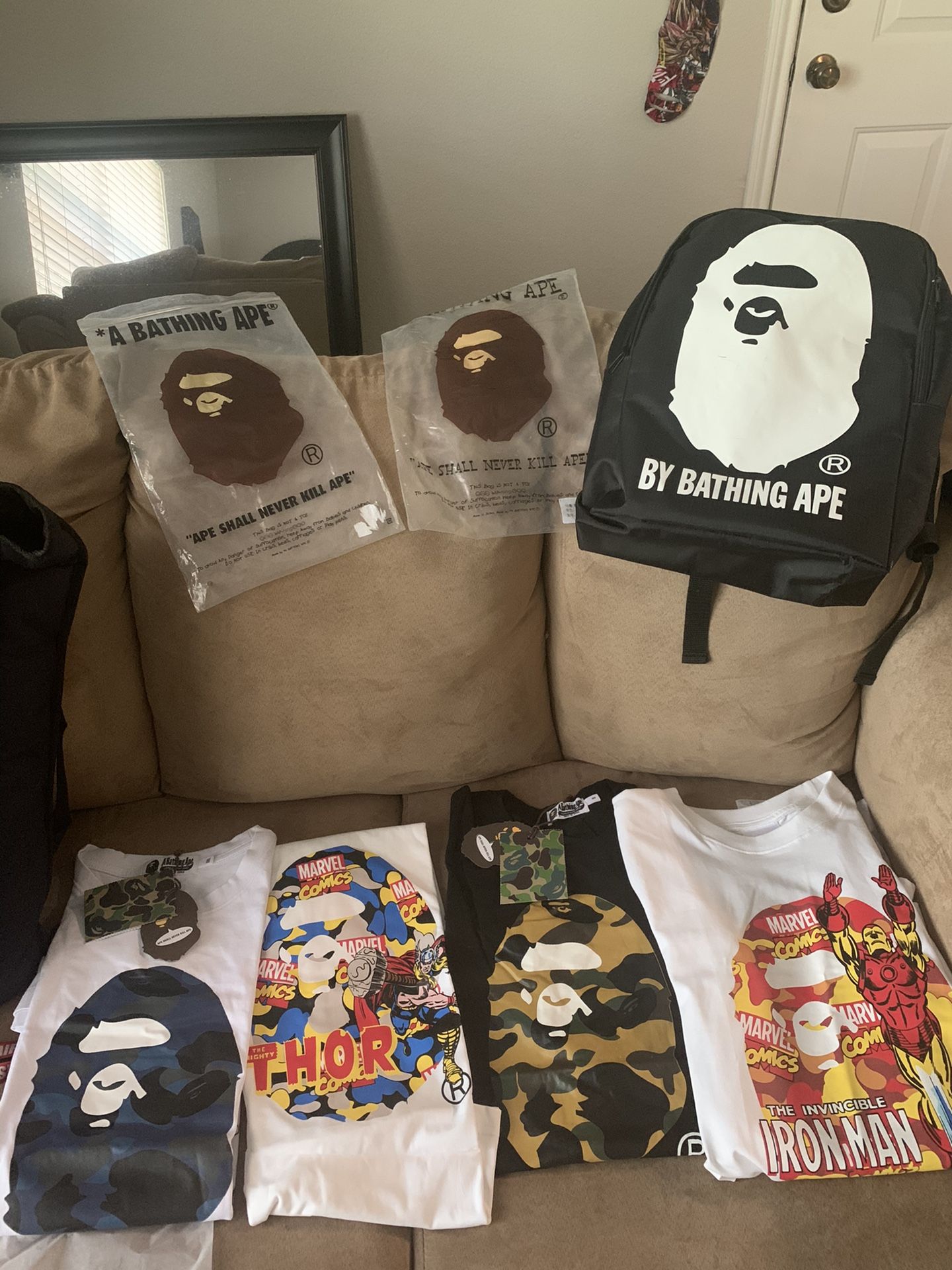 Bape T-Shirts & Back Packs.