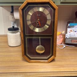 Devon Quartz Wall Clock With Pendulum.