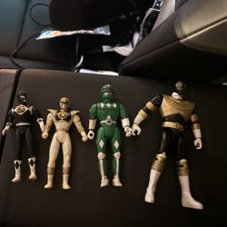 Four Vintage Power Ranger Action Figures