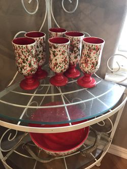 Red and green speckled handmade goblets and bowl