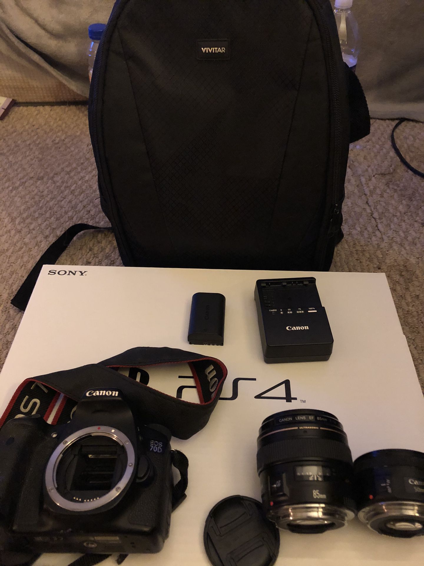 Canon 70D kit with 85mm 1.8 lens & 50mm 1.8 lens camera bag and charger with battery ( no sd card)