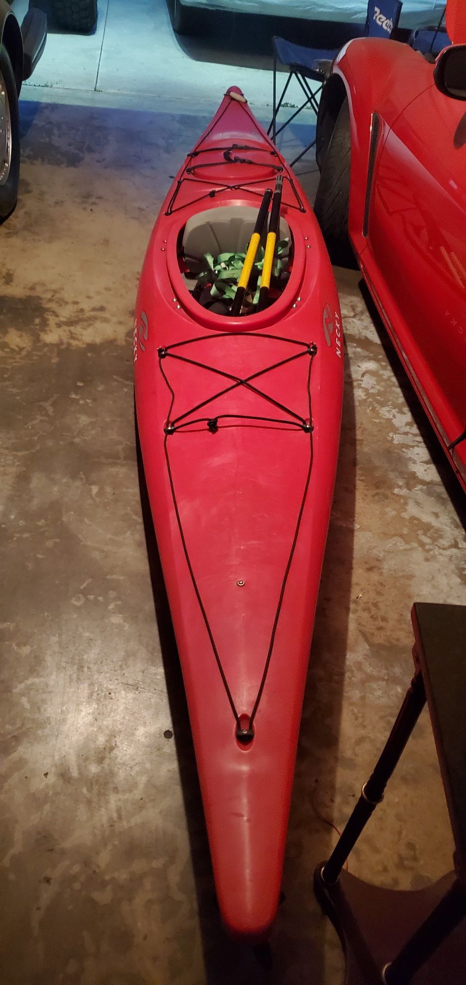 Necky kayak with paddle