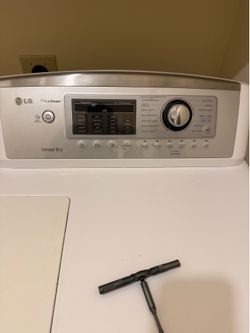 Used 7.3 cu. ft. Ultra Large Capacity Smart Wi-Fi Enabled Rear Control Electric Dryer with TurboSteam