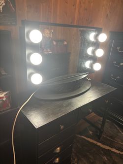 Huge black impressions vanity mirror